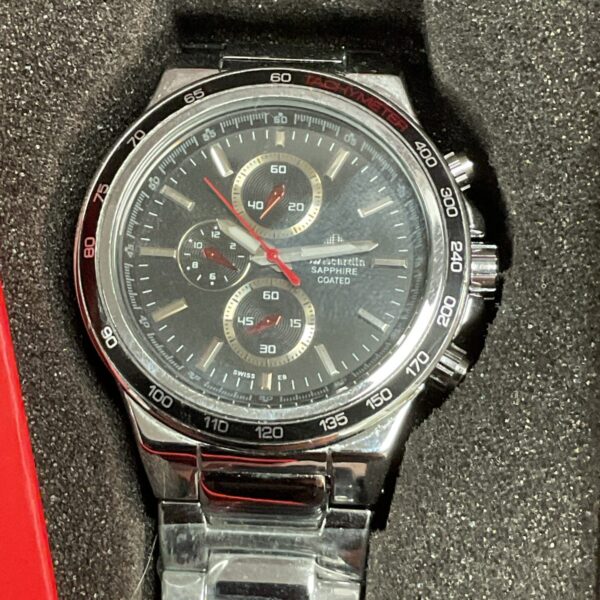 Swisscardin gents watch with chronograph dial and stainless steel bracelet.