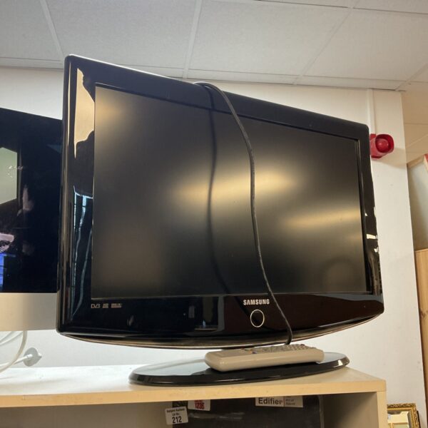 Front view of a Samsung 24” HD television with remote.
