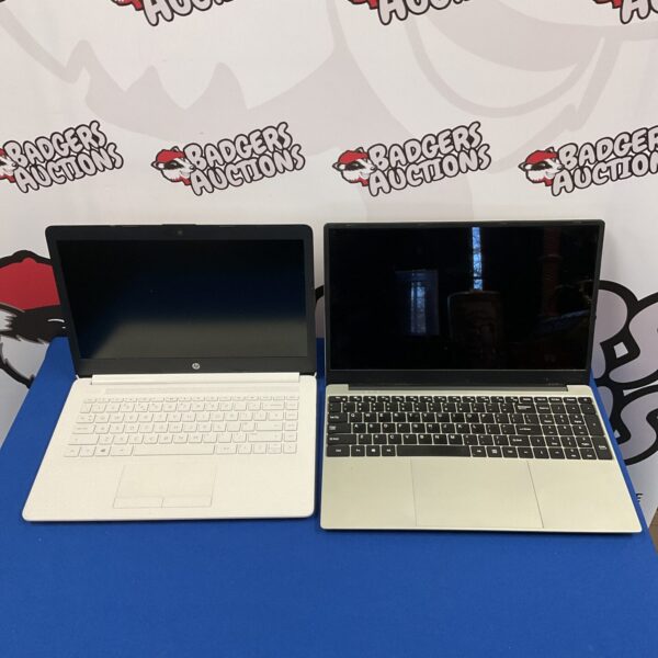 Front view of the HP CM507A laptop for auction.