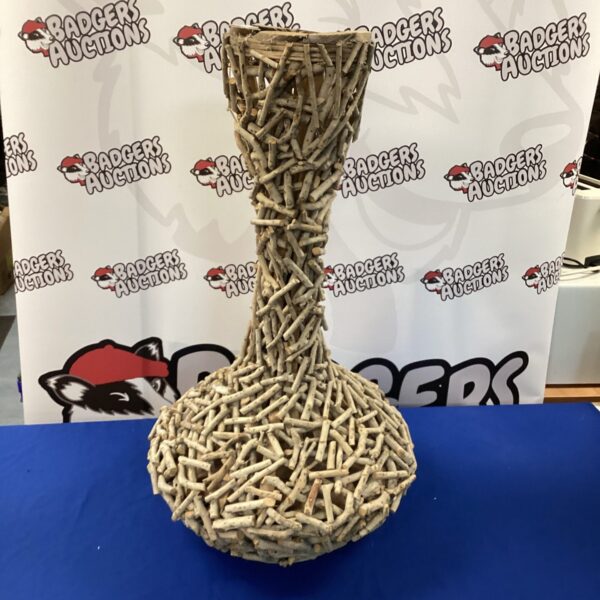 Large folk art twig vase, rustic handmade decorative piece.