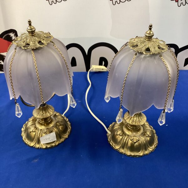 Pair of vintage Tiffany style table lamps with stained glass shades.