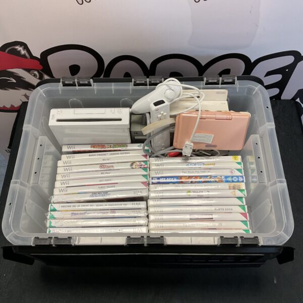 Nintendo Wii console and games presented in a lot.