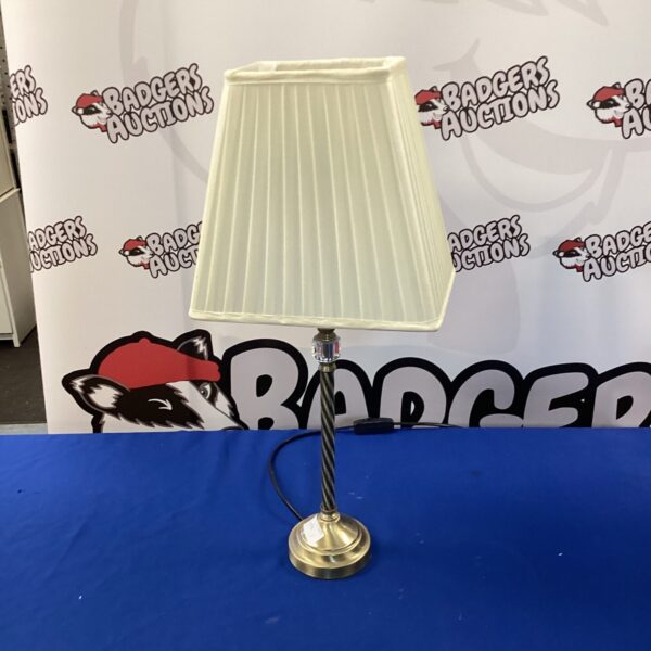 Vintage Laura Ashley table lamp with cream shade and brass base.