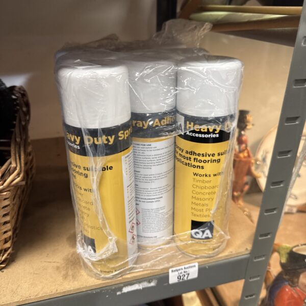 Nine cans of heavy duty flooring adhesive spray for installation.