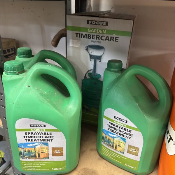 Rich Cedar timber treatment with sprayer for garden wood preservation.