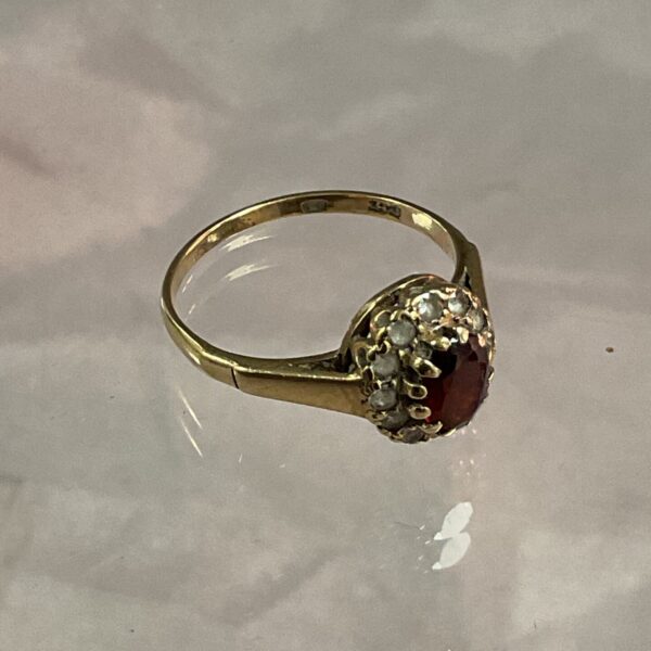 Vintage 9ct gold ring with red and white stones.