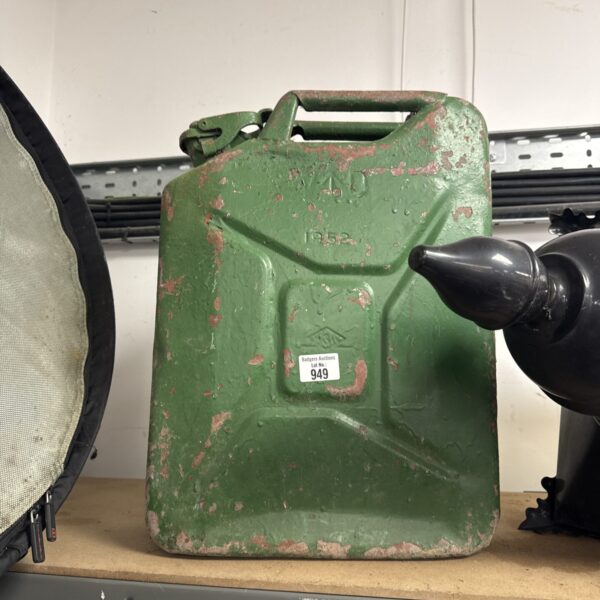Vintage 1952 military jerry can for fuel storage.