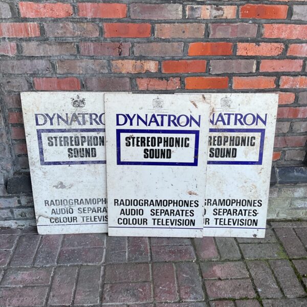 Vintage Dynatron advertising boards, wooden retro signage.