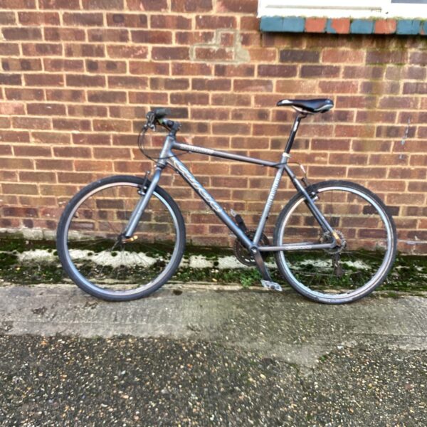 Grey Carrera Subway hybrid bike presented for auction.