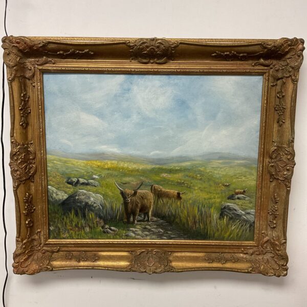 Original oil painting of Highland cattle in a Scottish landscape with gilt frame.