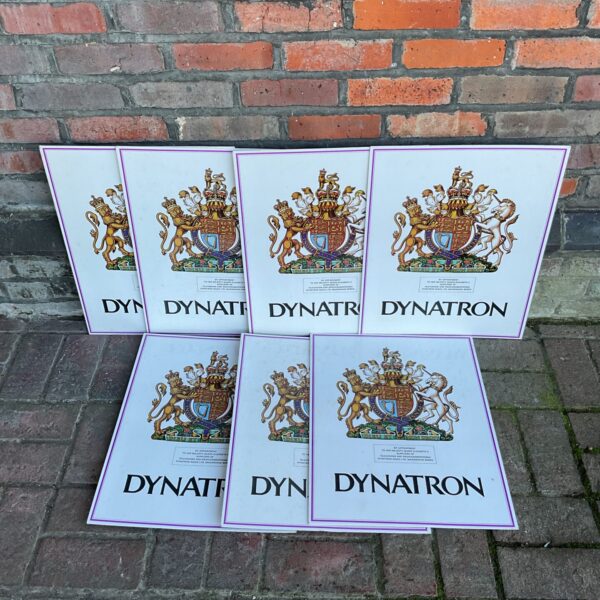Lot of seven vintage Dynatron crest boards displaying the royal crest.
