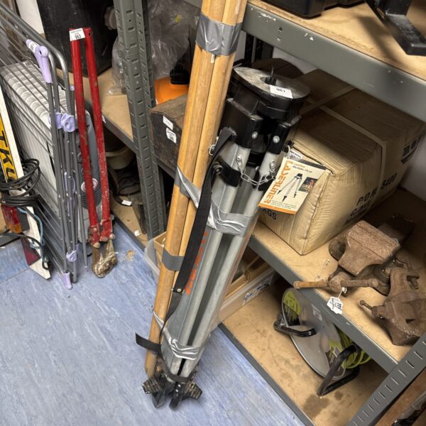 Used Laserliner tripod with wooden marker stakes for surveying.