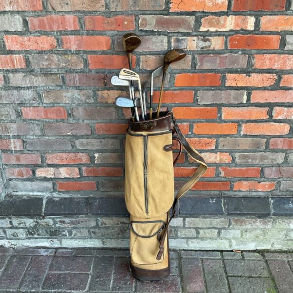 Vintage golf club set with Michael Bingham branding in canvas bag.