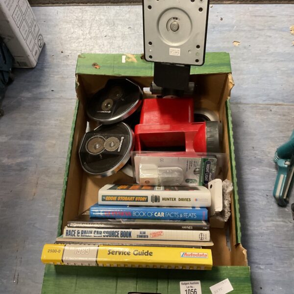 Mixed lot of car audio speakers, books, and a vintage lantern.