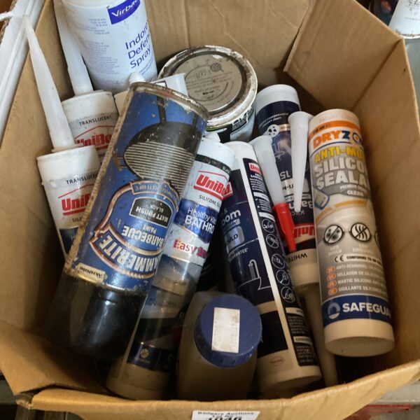 Assorted silicone sealant and paint lot for DIY projects.