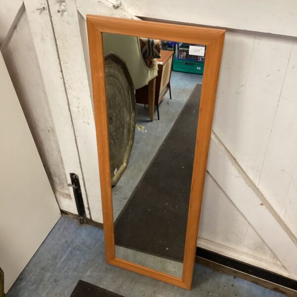 Vintage rectangular wooden mirror for hallway or bedroom decor.