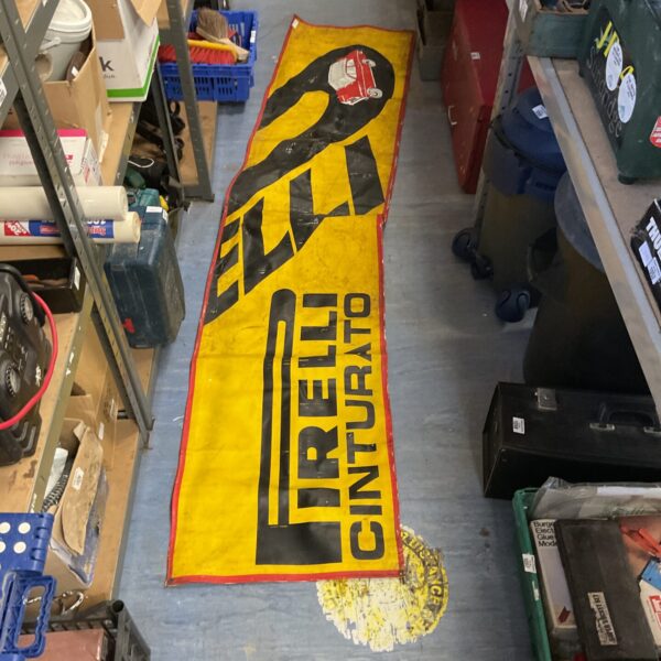 Vintage Pirelli Cinturato mat with bold yellow and black branding.