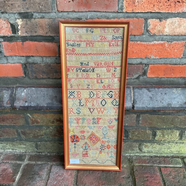 Antique George II sampler from 1758 with detailed needlework.
