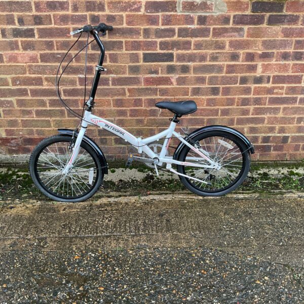 Side view of a silver Integra folding bike.