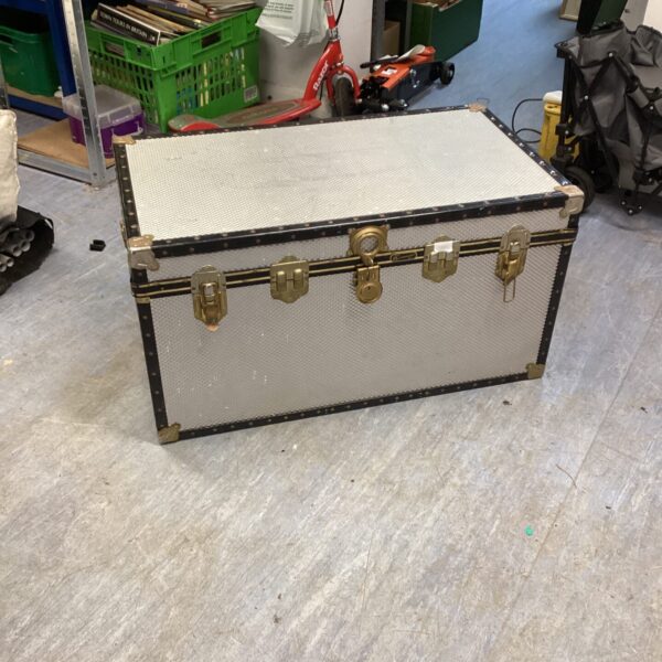 Large aluminium chest with handles, ideal for storage and transport.