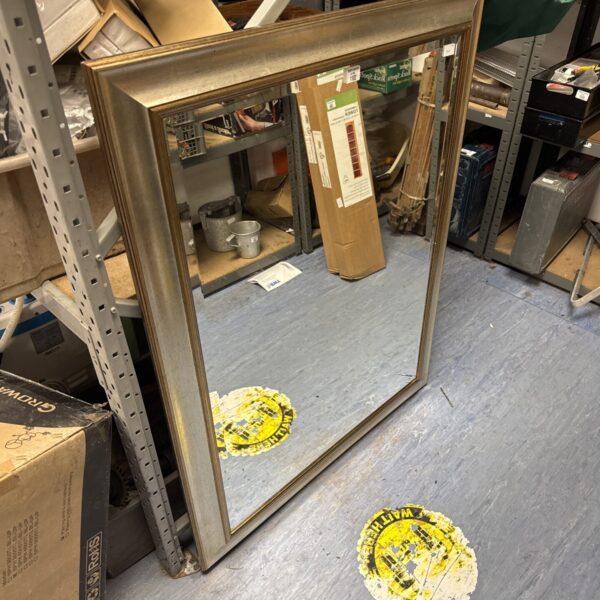 Large bevelled glass mirror with vintage frame.