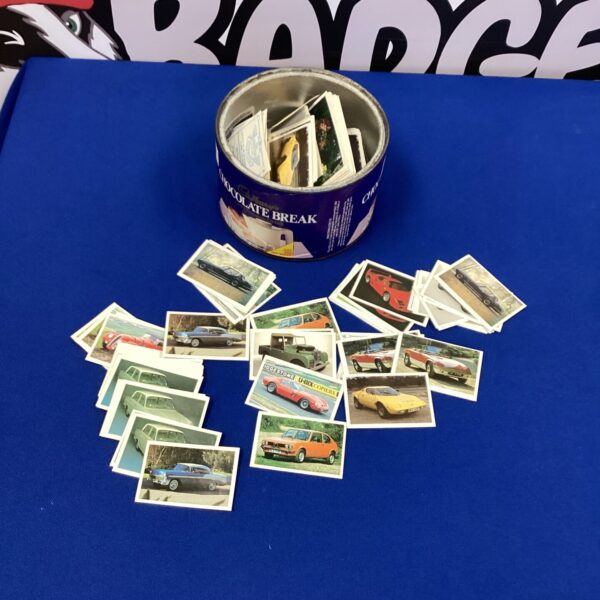 Vintage tin filled with collectible car tea cards.
