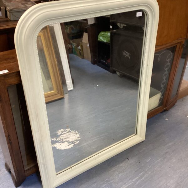 Large vintage wood framed mirror for wall decoration.