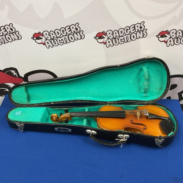 Vintage Lark child's violin in its original case.