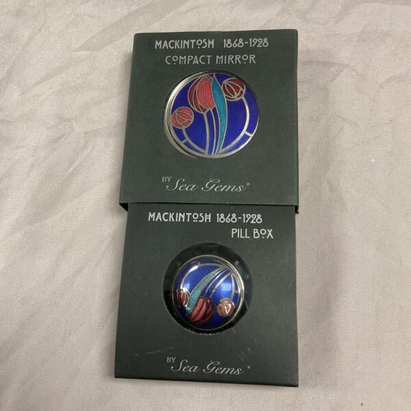 Vintage Mackintosh 1868-1928 compact mirror by Sea Gems with enamel detail.