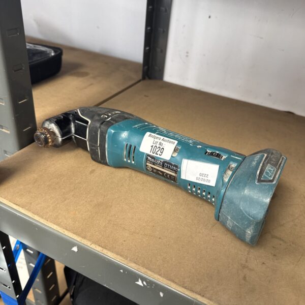 Makita DTM50 cordless screwdriver body, close-up view.