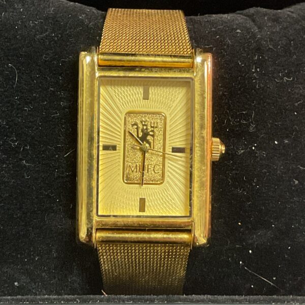 Front view of a vintage Manchester United ladies wristwatch.