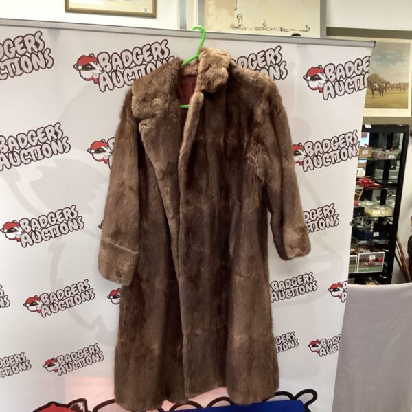 Vintage brown mink style fur coat for women.