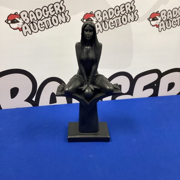 Black resin lady figurine, modern sculpture for home decor.