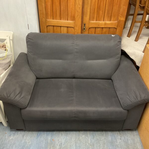 Modern grey two-seater sofa for living room seating.