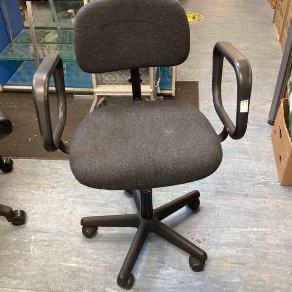 Black office swivel chair with adjustable height and five-star base.