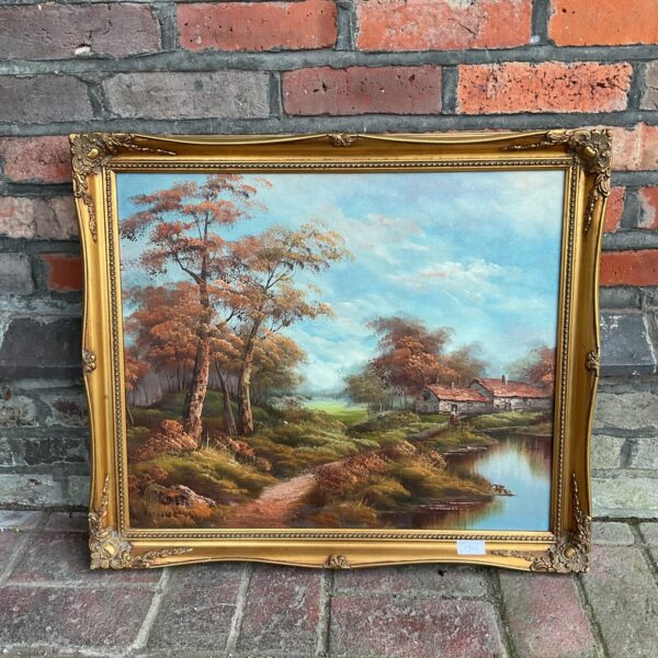 Vintage oil painting of an autumnal river landscape with a farm.