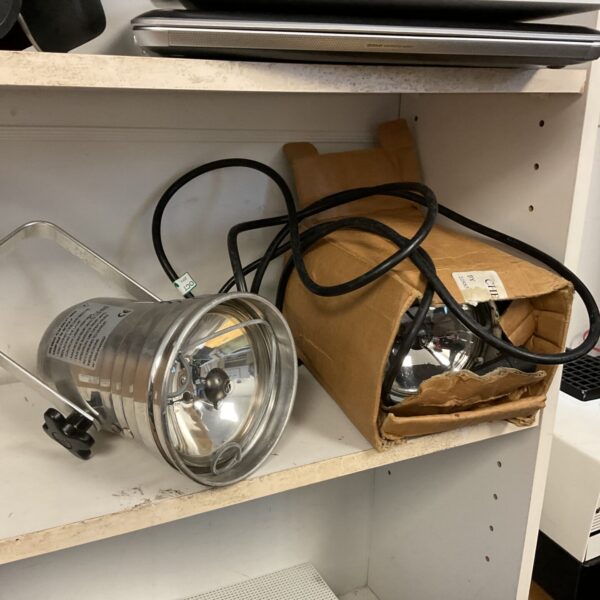 Pair of vintage chrome spotlights with adjustable heads.