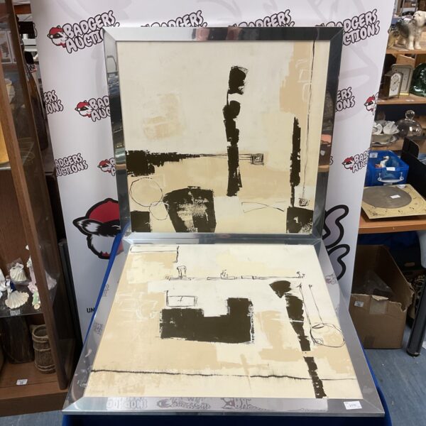 Pair of abstract artworks on canvas, modern art aesthetic.