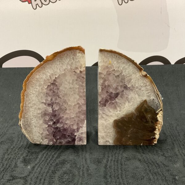Pair of purple amethyst crystal bookends for home decor.