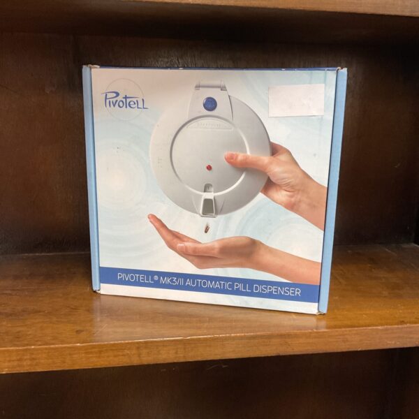 Vintage Pivotek automatic pill dispenser for medication management.
