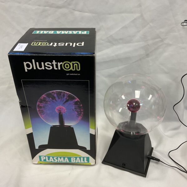 Black base Plustron plasma ball creating colourful light filaments.