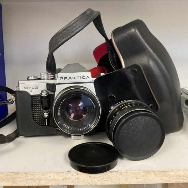Front view of a vintage Praktica MTL3 35mm film camera.
