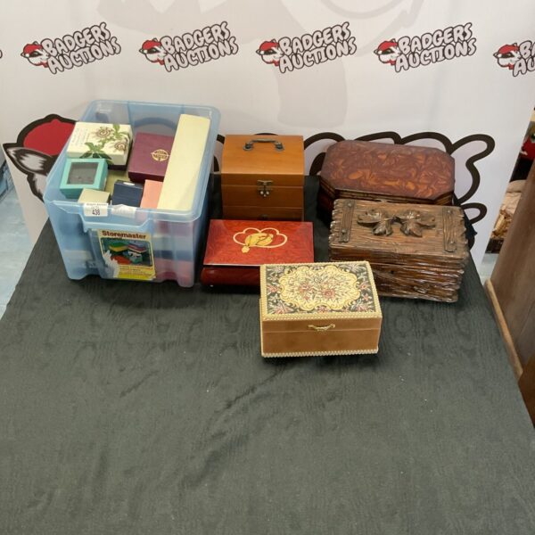 Vintage lot of empty jewellery boxes and cases for storage and display.