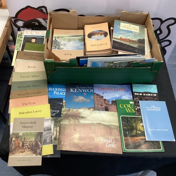 Lot of National Trust brochures and guidebooks for historic houses.
