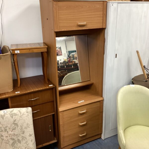 Vintage retro vanity unit with mirror and light in a bedroom setting.