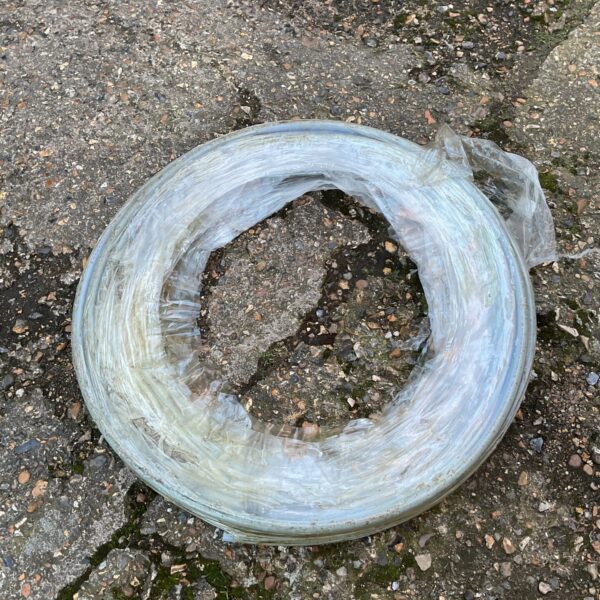 Roll of clear plastic tubing for various applications.