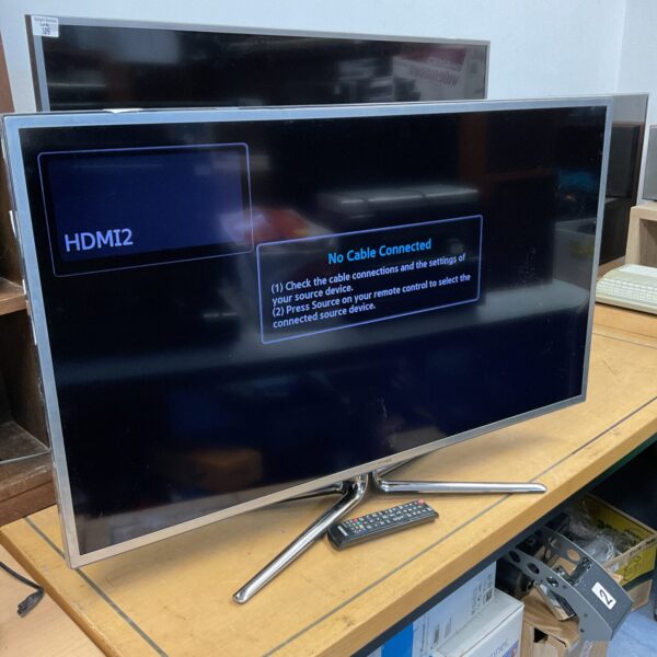 Samsung 40 inch HD television with remote control displayed.