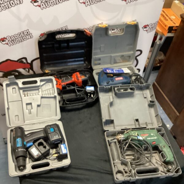 Black and Decker power tool selection including cordless drill and impact driver.