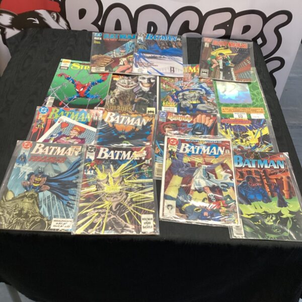 Vintage lot of Spiderman and Batman comics for collectors.