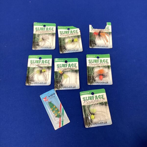 Vintage surface popper fishing lures for sale.